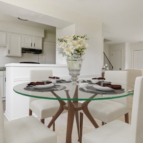 dining room with a glass table and chairs