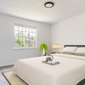 bedroom with bed and large window