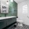 bathroom with a large mirror and ample lighting